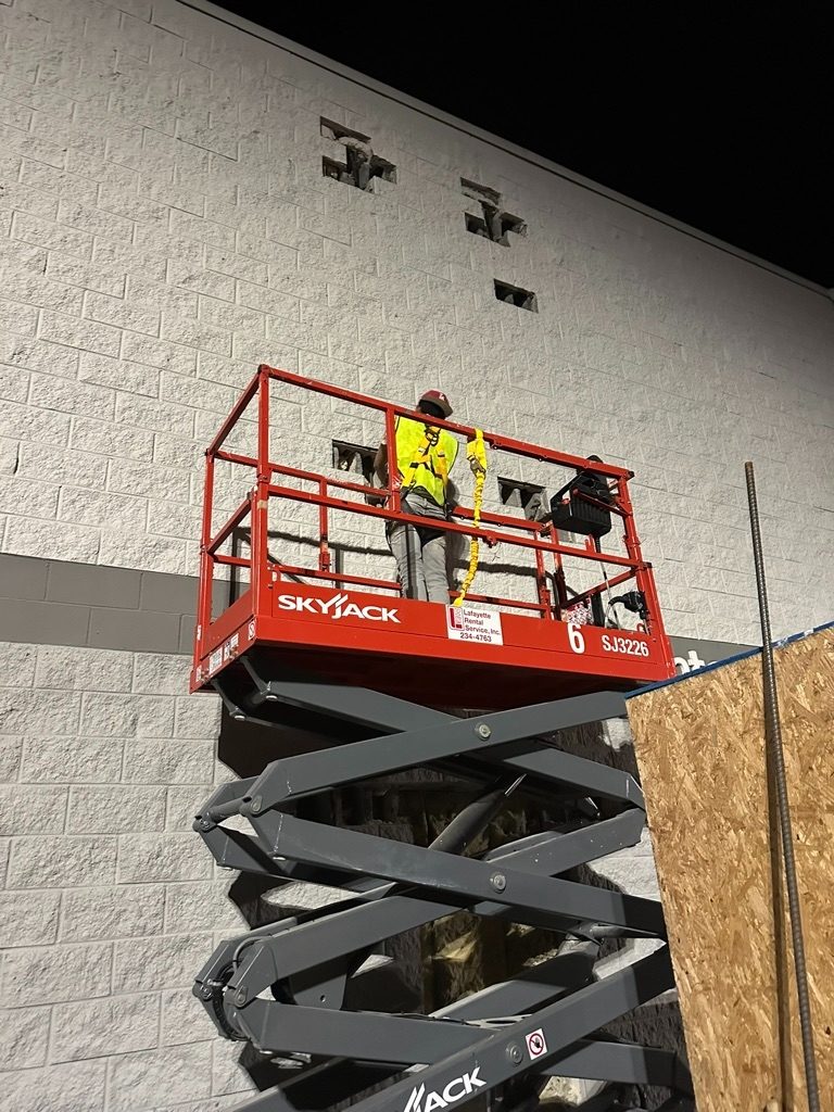 Walmart exterior scissor lift renovation work