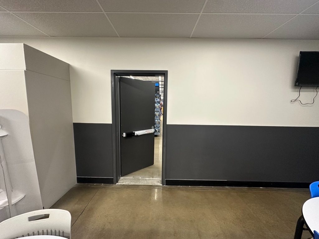Walmart commercial corridor with new exit door