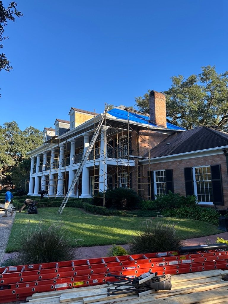 Greek Revival home full elevation during restoration