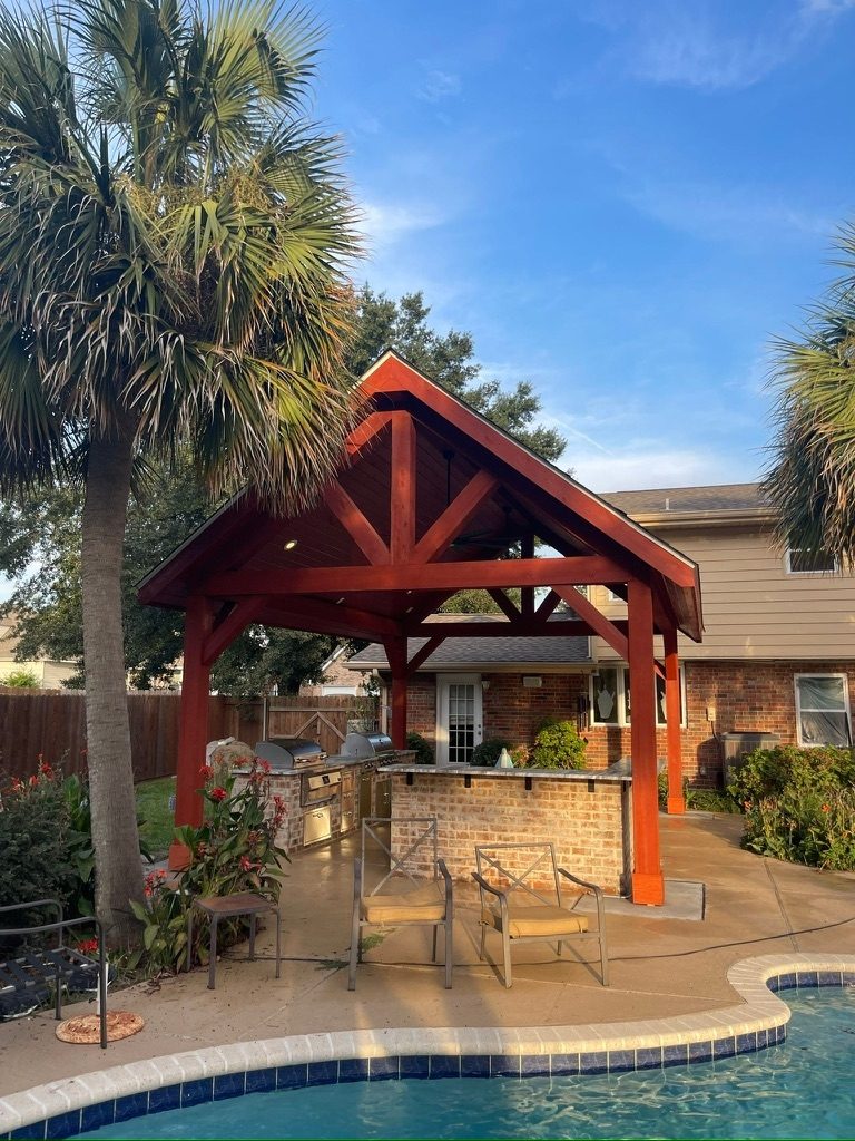 Pool pavilion with red beams